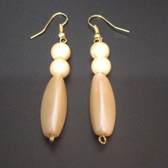 Elegant Gold and Peach Dangle Earrings