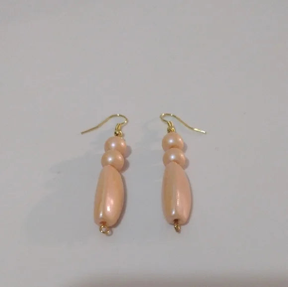 Elegant Gold and Peach Dangle Earrings